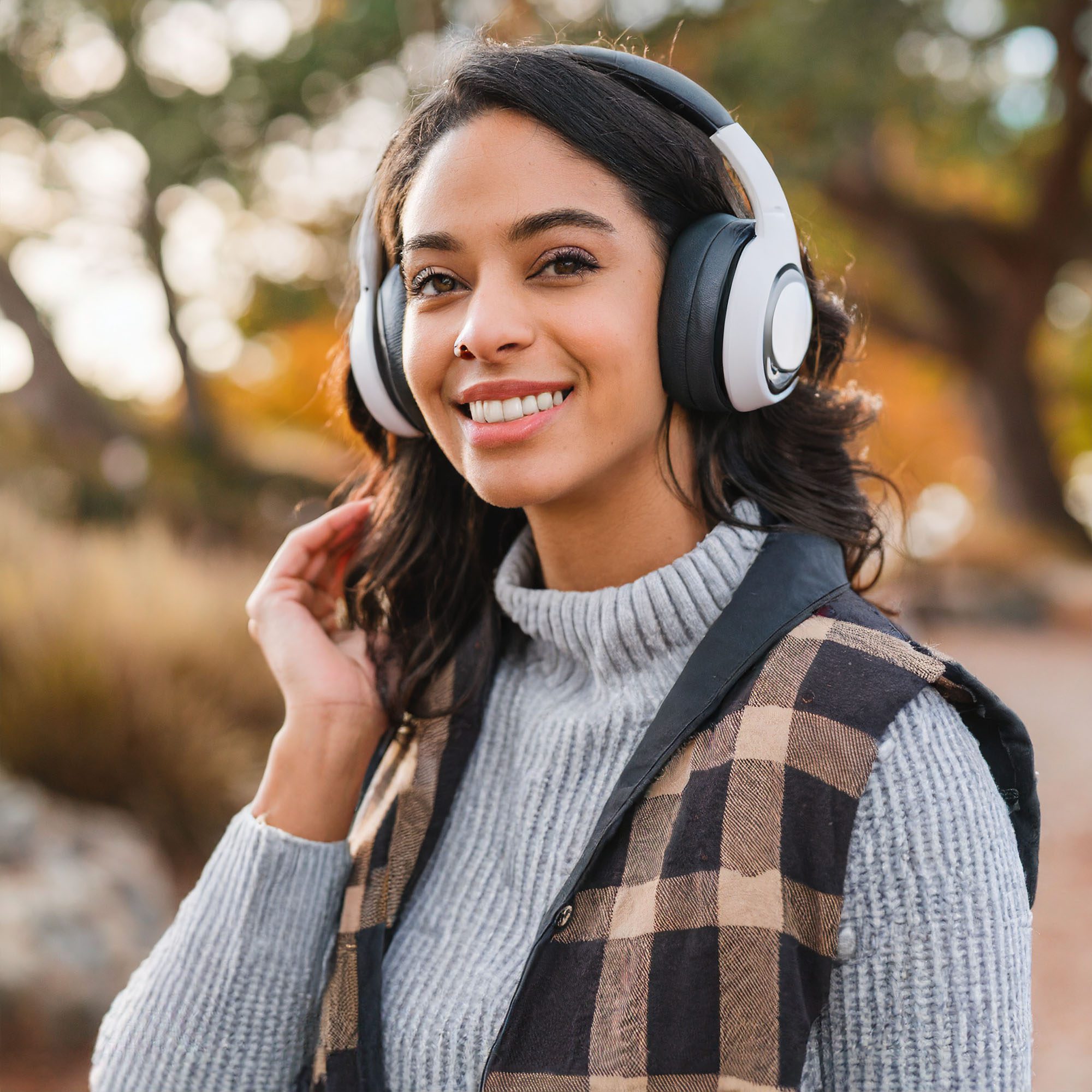 AI generated image of a female podcaster wearing heaphones.