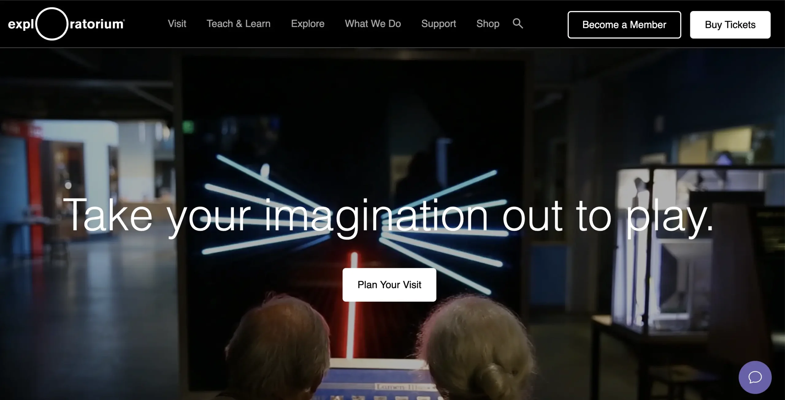 Homepage of the Exploratorium museum with the tagline “Take your imagination out to play,” showing visitors interacting with a glowing light exhibit.